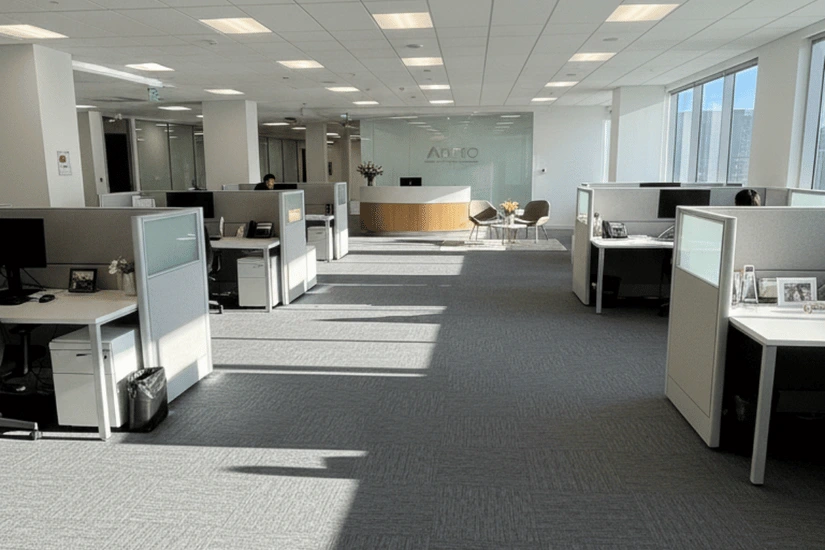 Interior office space before demolition — stripped to concrete floor and structure by Roxa Demolition